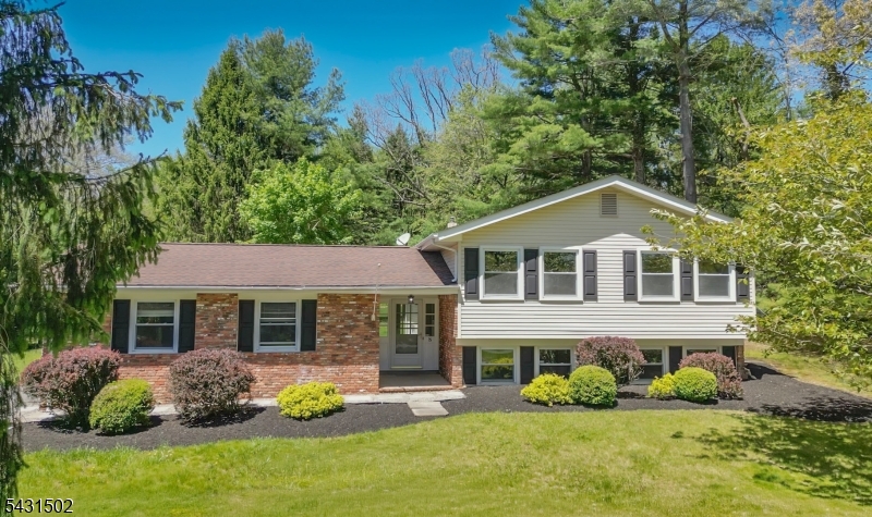 Beautiful renovations, well landscaped yard, quiet neighborhood, minutes from major highways......Don't wait!  This home will not last and you will see why!!  5 Bedroom, 3 Full Baths, In-Law Suite with updated Kitchen, nicely kept spacious 2 Car Garage, Stone Patio perfect for entertaining or grilling out and covered Deck with separate entrance  to the Kitchen.  Don't miss out on this quiet oasis!