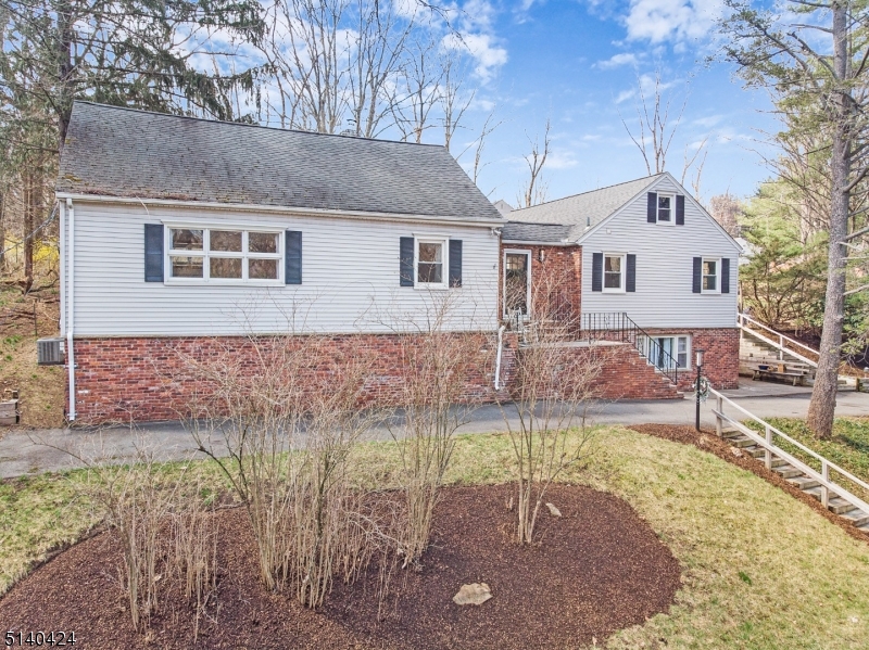 You'll absolutely fall in love with this unique 4 bedroom 3 bath home on more than half an acre! Kitchen updated in 2017 with granite countertops, subway tile, and stainless steel appliances. Dining Room features built in china cabinets perfect for storage! Wood floor and ample amounts of natural light throughout. Spacious bedrooms. Two basements: one finished, one unfinished used for laundry, utilities, and storage. Full Finished basement features large family room with luxury vinyl plank flooring, full bathroom, and walkout to driveway. Potential for home office, separate suite, and so much more. Large private parklike setting in backyard perfect for entertaining. NEW air conditioning units & ductwork installed in 2020! Hooked up to Public Water in March 2022. Location is just 2 miles to downtown Morristown. Close proximity to major transportation, highways, shops, parks, schools, playgrounds, and running and hiking trails; Patriots Path. Move right in and enjoy what this home and the Morris twp. area has to offer!