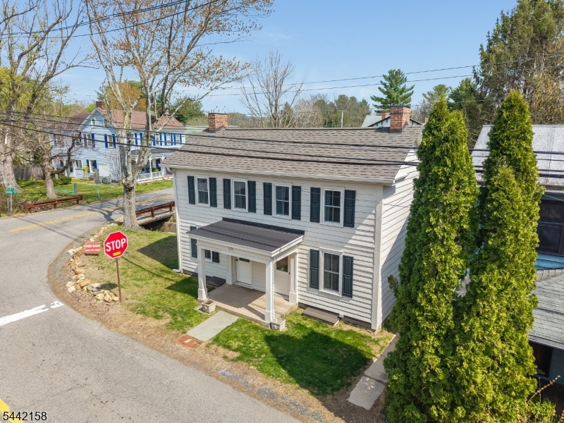 A TOTALLY RENOVATED, COMPLETELY UPDATED, AND BEAUTIFULLY RESTORED CIRCA-1825 FARMHOUSE COLONIAL GARAGE PARKING FOR UP TO FIVE CARS AND A GREAT LOCATION JUST SEVEN MINUTES FROM RT 78 IN THE QUAINT HISTORIC HAMLET OF LITTLE YORK, A PICTURESQUE COMMUNITY LISTED ON THE NATIONAL REGISTER OF HISTORIC VILLAGES. SET ON A 0.7-ACRE CORNER LOT, THIS CHARMING TWO BEDROOM AND TWO FULL BATH HOME OFFERS THE PERFECT BLEND OF PERIOD CHARACTER AND MODERN COMFORT. THOUGHTFULLY RENOVATED WHILE AT THE SAME TIME PRESERVING ITS HISTORIC INTEGRITY, THIS LOVELY RESIDENCE OOZES WITH CHARACTER WITH ORIGINAL PINE FLOORS, PERIOD MOULDINGS, AND AUTHENTIC INTERIOR DOORS. A FLEXIBLE HOME OFFICE ALSO PROVIDES ADDITIONAL LIVING OR WORKSPACE IF NEEDED. OUTDOOR AMENITIES INCLUDE TWO INVITING PORCHES, A PATIO, AND A SPACIOUS BACKYARD IDEAL FOR GARDENING, ENTERTAINING, OR RELAXATION. A RARE BONUS FOR A HOME OF THIS KIND IS ON-SITE PARKING FOR UP TO TEN CARS AND GARAGE SPACE FOR AS MANY AS FIVE VEHICLES. LOCATED IN THE HEART OF THE BEAUTIFUL DELAWARE RIVER VALLEY, PORTION OF HUNTERDON COUNTY, THE PROPERTY IS JUST MINUTES FROM MILFORD, FRENCHTOWN, STOCKTON, LAMBERTVILLE, AND NEW HOPE, AND OFFERS EASY ACCESS TO RESTAURANTS, SHOPS, GALLERIES, FARM STANDS, WINERIES, BREWERIES, AND OUTDOOR RECREATION INCLUDING HIKING, BIKING, FISHING, AND CANOEING. THE LITTLE YORK RESTAURANT IS JUST STEPS AWAY, AND I-78 IS ONLY SEVEN MINUTES FROM YOUR DOOR FOR CONVENIENT COMMUTING TO NEW YORK CITY, PHILADELPHIA, AND BEYOND.