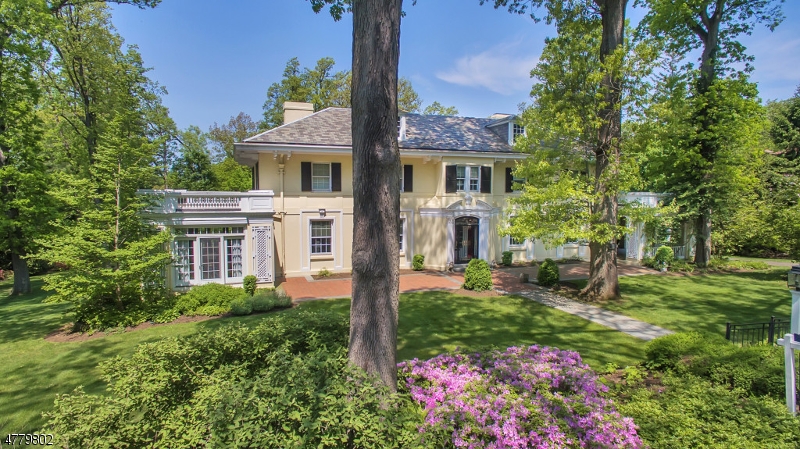 One of Summit's finest homes, this manor house, circa 1910, exudes style, charm and numerous amenities.The formal rooms functionally flow for  comfortable entertaining , while the casual rooms are ideal for relaxed living. Features include higher ceilings, hardwood on the first and second levels, 5 fireplaces, elaborate moldings & spacious rooms.  Highlights include expansive Gourmet Kitchen with Center Island, Breakfast Room and Formal Butler's Pantry, a stunning Family Room with a fireplace and intricate Master Suite with Bedroom, Sitting Room and Bath.  The outside is as embracing as the interior of this property. The grounds,1.2 acres, are beautifully manicured and intensified by mature plantings, trees and lawn along with an open porch. Appealing located near town, NY transportion & the schools.