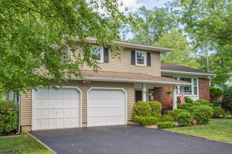 Wow!  Not a thing to do but unpack!  Perfectly maintained and beautifully updated split in a fantastic community!  Warm and inviting family room with wood-burning fireplace, 1st floor home office or 4th bedroom, partially finished basement level, updated maple kitchen with skylight and granite countertops, recessed lighting, hardwood flooring in living and dining rooms, 3 additional spacious bedrooms on 2nd floor with hardwood under carpeting.  Other home features include thermal windows and public utilities.  Minutes to all shopping, dining and major highways plus an incredible school system!