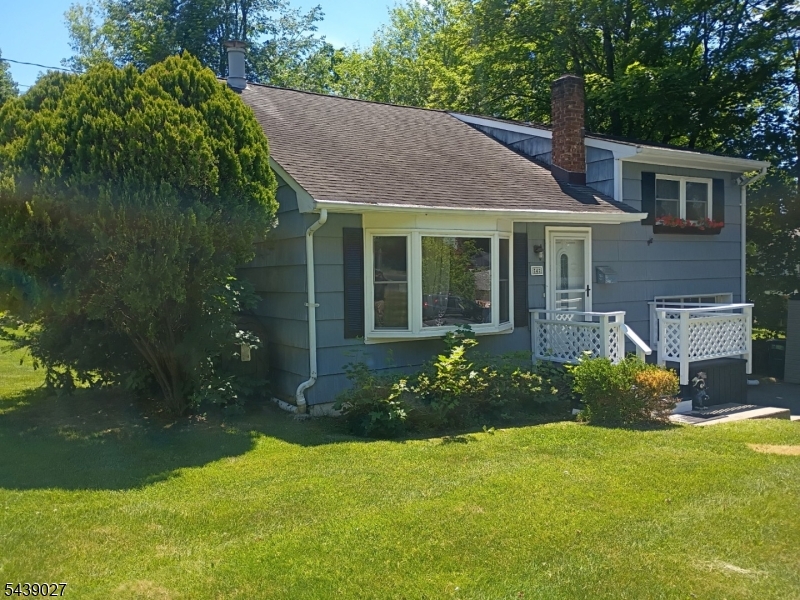 You will love this home!!! Beautiful Sun filled Split-level home, located on a large open corner lot with plenty of curb appeal. This home offers 9 very generous sized rooms, beautiful hardwood flooring, one and a half baths, large walk out ground floor family room, with a bedroom/office, half bath. laundry room and garage access. The spacious main floor living room with bay window lets in loads of sunlight, flawless hardwood floors, dining room with plenty of room for entertaining overlooks the living room, nice eat in kitchen, three generous bedrooms and a newly renovated bathroom. The large useable yard is great for entertaining or just enjoying quiet evenings at home.