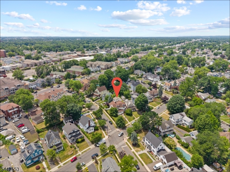 Welcome to an incredible, high-income producing opportunity located in the highly desirable and quiet residential section of Elmora Hills in Elizabeth, NJ! This massive, 5328 square foot multi-family property is perfect for a savvy investor looking to maximize their portfolio or a buyer wanting to occupy one unit while renting out the other two. The first unit is exceptionally spacious; offering three bedrooms and three bathrooms. Its main floor features a large kitchen, a bright living and dining area, two bedrooms and two bathrooms-including a primary bedroom with its own private bath. Up on the second level of this same unit, you will find an additional private bedroom and bathroom. The second unit features a comfortable two-bedroom, one-bathroom layout, while the third unit offers a cozy one-bedroom setup. Flooded with natural light, this home boasts a beautiful front yard, a detached garage, and a private driveway with ample parking. Situated in a convenient location, it offers close proximity to local shopping centers, parks, public transit, major highways, and Kean University. With its massive footprint, fantastic neighborhood, and immense rental upside, this property is a rare find that has a substantial return on investment. Don't miss out on this fantastic Elmora Hills gem-schedule your private tour today and see the endless potential for yourself!