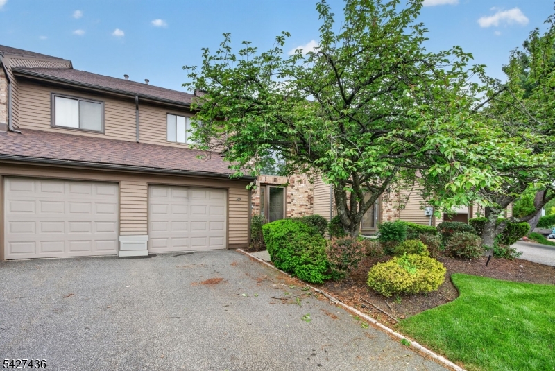Fantastic Castle Ridge townhome with rare 3 Bedroom floor plan option plus 2.1 Baths. As you enter, you are greeted by a grand 2-story foyer that sets an elegant tone for the rest of the residence. The spacious living room features new luxury wood-like flooring and a sliding door that leads to a private patio and lush green yard area. The adjacent dining room, also adorned with luxury wood-like flooring, offers a seamless transition with an open step-down into the living area. The well-appointed kitchen is equipped with all new stainless steel appliances, tile flooring, 3 walls of cabinetry, and a convenient pass-through to the living room. Completing the 1st floor is a modern powder room. dedicated laundry room and direct access to the 1-car garage. The 2nd level features a primary suite designed for relaxation with luxury wood-like flooring, a generous walk-in closet + 2 additional closets. The primary bathroom offers a bathtub and separate shower. 2 additional bedrooms, each with luxury flooring and ample closet space, share a well-maintained hallway bathroom. The hallway also includes a large closet with double slider doors. Living in the Castle Ridge Condominium Association provides access to wonderful additional amenities including a community pool with a separate dipping pool and 2 tennis courts. Enjoy convenient access to Route 10 shopping, groceries, and dining, as well as proximity to major transportation arteries such as Routes 80, 287, 280 and 46.
