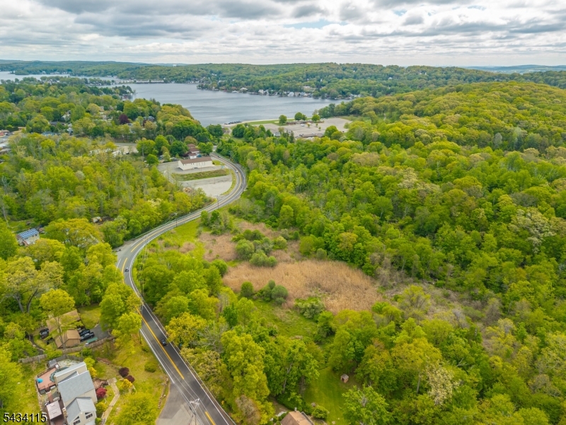 Lot located in desirable lake community. Interested buyers must do their due diligence. Planning and zoning department will provide credible information. Detailed site plan approval required by the town board. Water and sewer dept confirmed public sewer hook up in street. At this time no public water hook up, well required. Lot is in B2 zone which also includes B1 zone. Refer to boro website.