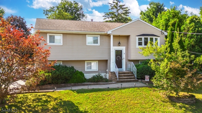 Welcome to this amazinng home situated in the "Crescent Park" section of West Milford. This beautiful home boasts 4 Bedrooms and 3 full bathrooms and has so much to offer. The kitchen and dining area open up to the cozy living room which makes a great space for entertaing. The sliders from the dining area bring you right to the spacious composite deck which overlooks the back yard with the above ground pool and storage shed. Stairs off the deck bring you down to the lower level and yard. Don't forget about the oversized 1 car detached garage with huge driveway and awesome basketball set up. Down here you also have a lovely patio with another sitting area for guest. You can walk through sliders off the patio into the lower living room area which features a gas fireplace or if you like you can enter from the driveway into a seperate entrace where you find a summer kitchen fully equipted with a refrigerator, dishwasher, microwave oven and of course, washer and dryer. You also have a huge playroom/office area, a full bedroom and full bath as well. This home will not disappoint and is being sold as is. Schedule your showing today! HIGHEST AND BEST DUE THURSDAY JULY 23 6PM