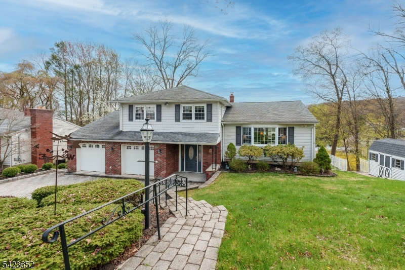 Welcome Home to this Spectacular Custom Home Tucked Away on a Quiet Cul-De-Sac in the Highly Desirable Side of Butler. This Exceptional Home is Filled with an Abundance of Light and Offers a Large Entry Foyer, A Formal Living Room and Formal Dining Room with Hardwood Floors Ideal for Entertaining. An Updated Eat in Kitchen with Custom Cabinetry, Granite Counter Tops, a Gas Range, Built in Microwave, Stainless Steel Refrigerator and Sliding Glass Doors to a Beautiful Sunroom Surrounded by Windows to Enjoy that Morning Cup of Coffee and Relaxing Views. There is an Entry Door to a Large Deck for Grilling and Enjoyment for Years to Come. The Very Spacious Family Room was Extended and can Possibly be converted into an In-Law Suite with a Half Bathroom/Laundry Room combination and its own Entrance. The Primary Bedroom offers a Walk in Closet a Full Bathroom with a Shower Stall. Two Additional Bedrooms and a Full Bathroom with a Tub/Shower.  The Basement offers a Recreation Room with an Abundant of Storage Space, a Utility Room, Workbench and a door to the back yard. A Lavish Paver Driveway, Sprinkler System, Alarm System, Newer AC and Many Updates Throughout this Home. Better Hurry on This One!  Close to Schools, Major Highways, Shopping, Restaurants, Golf Courses, Parks and only Approx.35 Miles from New York City. Make This House Your First and only Stop, you will be Glad You Did!