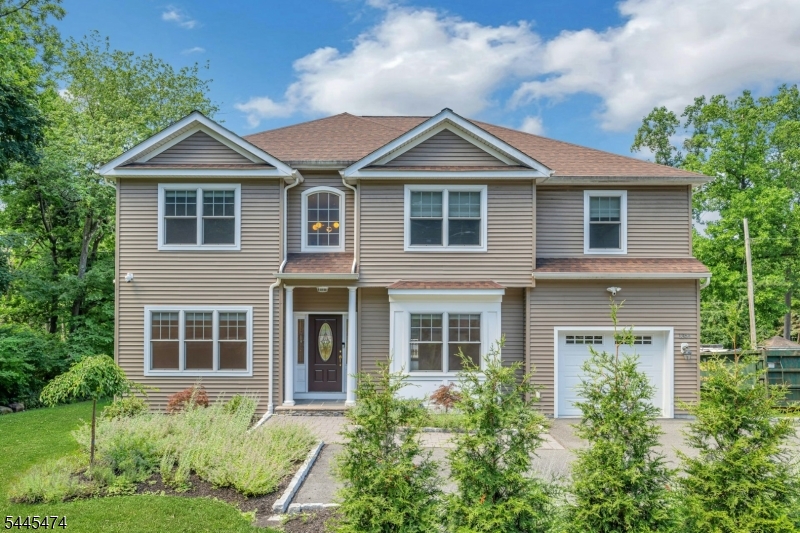 Built in 2021, this is a rare opportunity to own a newer home in one of Morris County's top-rated school districts. Step inside to soaring ceilings and a bright, open first floor that sets the tone for modern living. The gourmet kitchen anchors the space, featuring quality appliances and a generous island   ideal for both everyday meals and entertaining. The open-concept layout flows seamlessly from indoors to out, leading to a private backyard with a deck and pergola, perfect for alfresco dining. Upstairs, a spacious primary suite offers a true retreat, joined by three additional bedrooms, a full bath, and abundant closet space with a lifetime warranty of the master closet organizer. The walk-out basement provides even more room to gather, relax, or entertain. Modern comfort, timeless location   this one checks every box.
