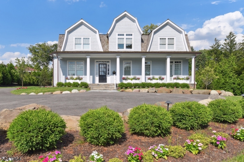 Spectacular New Construction Center Hall Colonial with 7,325 sq ft, set majestically on 3/4 of an acre of gorgeous property on a prestigious street in Old Short Hills, with stunning new saltwater pool with hot tub, electronic pool cover and summer kitchen, and totally level, fenced backyard ! This stunning home features a dramatic 2-story entrance hall, 10' ceilings on the 1st level & 9' ceilings on the 2nd & lower levels. With a terrific open floor plan, this home has ideal flow, perfect for grand entertaining, as well as for an easy & sophisticated lifestyle. Perfect home office and Guest bedroom suite conveniently located on the 1st level. 2nd level boasts luxurious Primary Suite with 2 walk-in closets, spa-like primary bath with radiant heated floors and soaking tub & 4 additional bedrooms, all en suite. Lower Level has a Nanny's Suite, recreation room, and exercise room. This stunning home has all the amenities you want including Smart Home Technology and Commercial Grade Home Network. Top craftsmanship completed in 2020 in a highly coveted Short Hills location, walking distance to the Short Hills Train Station, in highly rated Hartshorn Elementary district. Bus service is available to all schools! Sources ranked Millburn Schools #1 School System in New Jersey again in 2023!