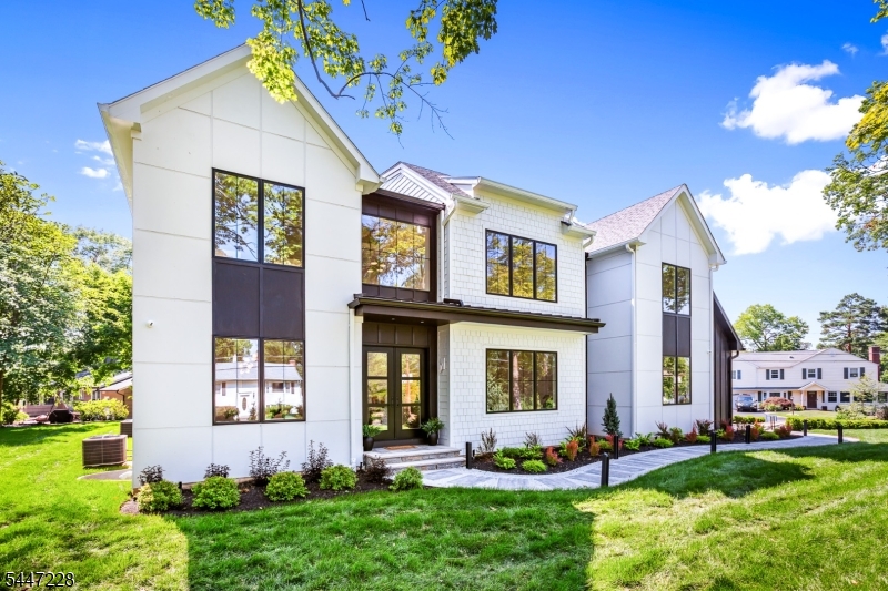 Welcome to 11 Florham Avenue - a bold, design-forward new construction by luxury builder Fernway Homes, offering three finished levels with six bedrooms and 5.5 baths. A soaring two-story foyer introduces light-filled living and dining rooms, a private office, a showstopping designer powder room and a dramatic two-story family room with fireplace, custom millwork and walls of windows. The heart of the home is a custom kitchen with warm wood cabinetry, Cambria quartz, high-end Viking appliances and a spectacular 9' x 5' waterfall island, complemented by a large pantry and butler?s pantry with wet bar. Upstairs, the serene primary suite features an illuminated dressing room with center island and a spa-like bath with radiant-heated floors, soaking tub and luxury Kohler shower system. The finished lower level, enhanced by 9-foot ceilings, offers a recreation room, media room, gym, bedroom and full bath. Outside, enjoy a covered rear porch with a dedicated gas line, professionally landscaped grounds, custom Kichler landscape lighting and Wi-Fi-enabled Rain Bird sprinklers. Pella Lifestyle casement windows, smart-home technology, indoor/outdoor speakers, EV charger, generator-ready systems and a two-car garage complete the home. A walking path at the end of Pinchbrook Drive connects to shopping, including Trader Joe?s, Starbucks and more. All in desirable Florham Park, convenient to recreation, downtowns, highways and Morris & Essex Line service to NYC.