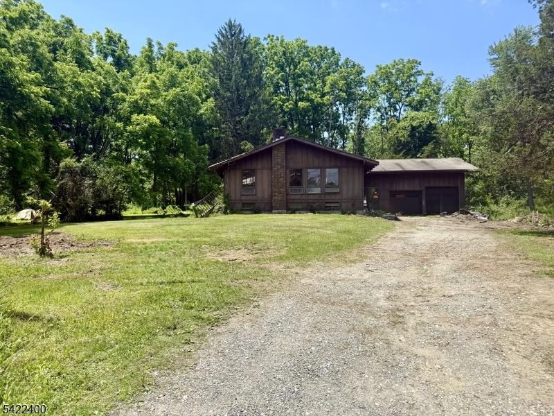 THE VALUE IS IN THE LAND! The lot is 1.84 acres. A prime opportunity to build your dream home in a well-established, sought-after neighborhood just minutes from all Vernon/Warwick has to offer. Survey is available in document file. There is no information available about the well or septic system. The house is not habitable. MUST HAVE A CONFIRMED APPOINTMENT.