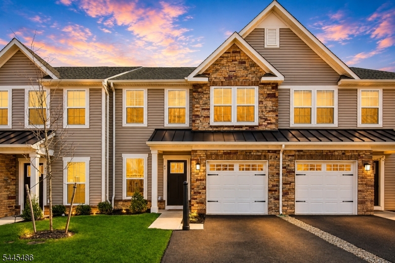 Discover a fantastic opportunity to own this modern, 2024-built gem that perfectly balances style and convenience. This spacious 3-bedroom, 2.5-bath home offers an inviting atmosphere and upscale finishes, making it an ideal fit for anyone looking for contemporary living in a prime location. Enjoy being close to major colleges such as Rutgers and Princeton, while also having easy access to vibrant shopping, dining, and numerous bustling city centers.  Step inside to an airy, open-concept layout designed for both relaxing and hosting. The heart of the home is a gourmet kitchen featuring bright white cabinetry, quartz countertops, a premium cooktop, and a large island that overlooks the dining and living spaces perfect for everyday life or entertaining friends and family. The main level is finished with durable, stylish luxury vinyl plank flooring and opens onto a large Trex deck, providing a seamless transition to outdoor relaxation. Upstairs, you'll find a restful retreat with three generously sized bedrooms. The luxurious owner's suite feels like a personal sanctuary with its high ceilings, custom closet system, and a private bath featuring dual vanities. The home is illuminated throughout with recessed lighting, enhancing its bright and welcoming feel. You will also appreciate the thoughtful details like the additional secondary bedrooms and a convenient, well-equipped upstairs laundry room.
