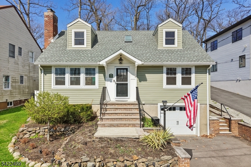 Beautifully updated home in the sought after Packanack Lake community, stylish open floor plan with newer modern upgrades, amazing lifestyle, including pool and lake living- Welcome home! Features include: a desirable open-concept formal LR w/ fireplace, spacious DR & a newer Kit with high-end appliances, upgraded cabinets and countertops, + a large center island. 4-seasons sunroom offers a bright, sun-filled room with many options for living based on your needs. 1st floor also includes: newer full BTH and 2 nicely sized BRs (1 currently used as laundry rm - W/D can be moved to BSMT - hook-ups already in place). 2nd FL includes: newer full BTH with cathedral ceilings and skylights, + 2 additional lge BRs. Step outside to your private retreat: large patio, a heated saltwater inground pool & lake views create a resort-like setting right at home. Wonderful for a party with your friends or a relaxing quiet evening at home, this home is perfect for entertaining all year long. Add'tl attributes: Recessed lighting, HDWD Flrs throughout, lge ready-to-finish BSMT w/ storage, 1-car gar, updated charming exterior, newer fence. Everything is very well maintained. Enjoy your perfect lifestyle with all that Packanack Lake has to offer: Swimming, beaches, park, community activities, boating, with golf and tennis available. Great Location: top rated schools, minutes to lake, restaurants, shopping, Trader Joe's, Whole Foods, major highways, town library and NJ Transit Bus and Train Center.