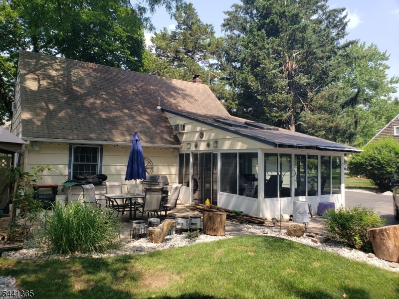 Well maintained Cape Cod. Open floor plan first floor. Master on first floor with bath. 2 bedrooms upstairs with 1/2 bath. Sun room 12 X 15.New Roof ( old roof was completely torn off) and gutters in 2024. New hot water heater in 2024. 5 ceiling fans. Includes Wash/dryer, Living room wall TV,