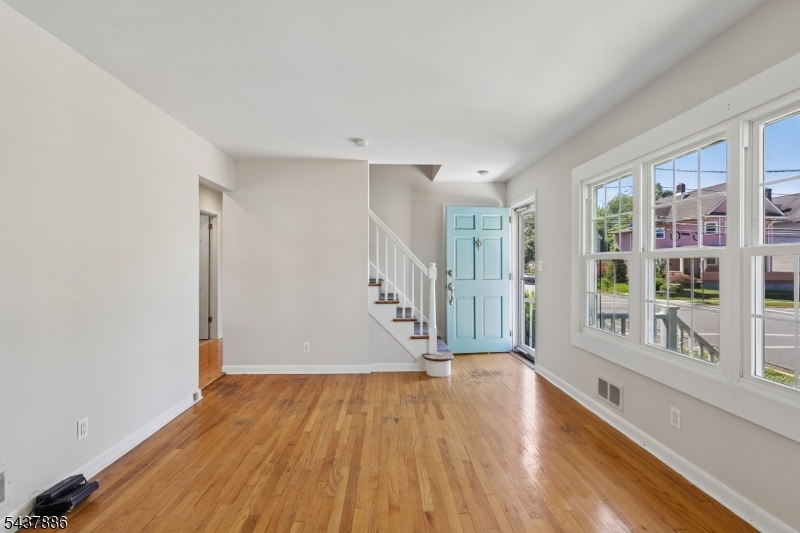 Welcome to this beautifully maintained 4-bedroom, 3-bathroom Cape Cod-style home in the heart of East Rutherford. Offering approximately 1,440 square feet of living space, this inviting residence combines classic charm with modern comfort. The spacious layout features hardwood flooring, a finished basement providing additional living and entertaining space, and a bright, functional floor plan ideal for today's lifestyle. The detached garage and ample off-street parking accommodate multiple vehicles, while the private backyard offers space for outdoor gatherings, gardening, or relaxation. Conveniently located near schools, parks, shopping, dining, major highways, and public transportation, this home provides easy access to New York City and all that Bergen County has to offer. A wonderful opportunity to enjoy comfortable suburban living in a highly desirable location.
