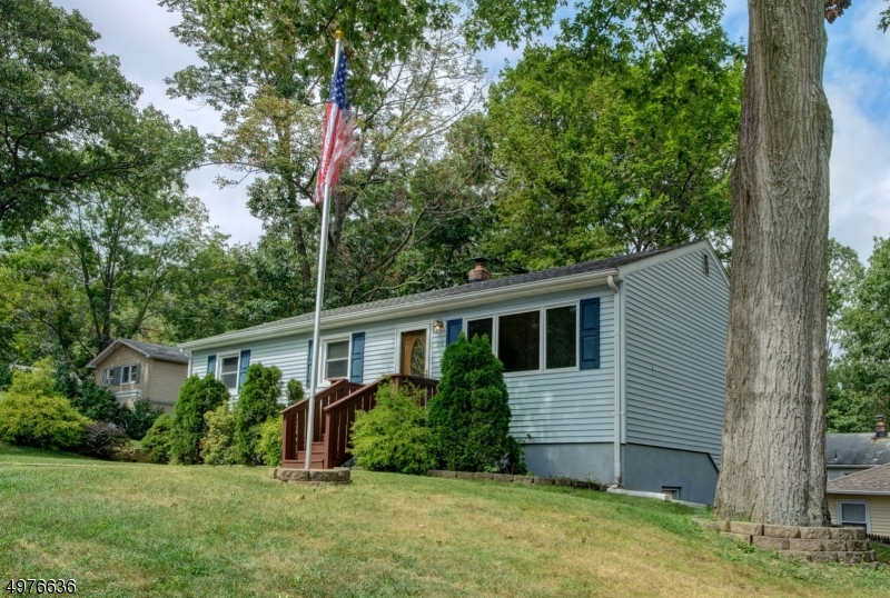 WELCOME HOME TO THIS TRUE GEM LOCATED ON A CORNER LOT IN THE LANDING SECTION OF ROXBURY! NEWER KITCHEN WITH CORIAN COUNTERTOPS & NEW APPLIANCES.  NEWER BATHS, NEWER WINDOWS, NEWER ROOF & SIDING. NEW HOT WATER HEATER.  ENTIRE HOME FRESHLY PAINTED. BEAUTIFUL WOOD FLOORS THROUGHOUT. TONS OF CLOSET SPACE!  EXTRA LARGE, FINISHED WALKOUT BASEMENT COMPLETE WITH LAUNDRY ROOM AND FULL BATH. TWO 275 GALLON OIL TANKS ABOVE GROUND. 200 AMP ELECTRIC. PUBLIC WATER & SEWER HERE!  SUPER CLOSE TO HOPATCONG STATE PARK AND LAKEFRONT DINING, ALL MAJOR HIGHWAYS. **Seller accepted offer; back up offers only.