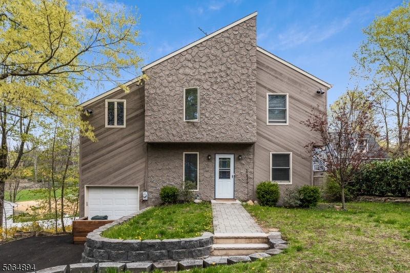 Love large bedrooms, natural light, loft space, and a low maintenance yard? This lovely contemporary home is all that and more.  High ceilings, updated kitchen and baths, and a gas fireplace, only steps from Reilly Park and ball field.  Conveniently located near 202 and major transit options.