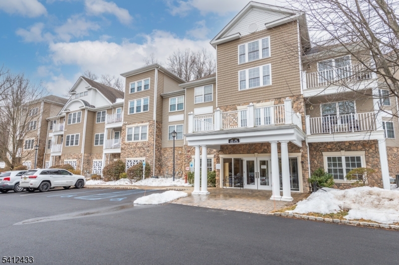 Welcome to easy, low-maintenance living, convenient to all that Morris County has to offer. The 2-bedoroom, 2-bath condo has a spacious kitchen, primary bedroom with ensuite bath, and a second bedroom, second full bathroom that can provide for additional living space, office or storage. In Unit washer and dryer along with central heat and air as well as garage parking, and resort-style amenities right at your doorstep, including a community pool, tennis courts and clubhouse with fitness center and game room.