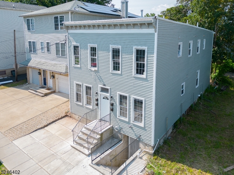 Welcome to 566 McChesney Street, a very rare 4-unit building--4 beautiful, modern, completely renovated apartments in the City of Orange, off the South Orange border! This gut-renovated building features two-- 2 bedroom, two bath duplex units and two 2 bedroom, one bath units on the second floor. The kitchens feature stainless steel appliances, quartz countertops, and beautiful cabinetry. Stackable laundry machines in every unit. Separated gas and electric meters.  Location is commuters dream--convenient access to the Orange Station to Newark Penn Station & New York Penn in minutes! Super close to NJ Turnpike, GSP & I-280! PLEASE NOTE--there are tenants in all 4 units. Apartments B & D are easier for quicker showings and you can see the exterior of the property. **Multiple offers received--Seller requests highest and best for this Sunday, June 16 at noon.