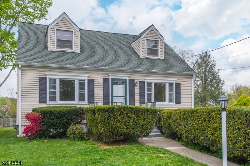 Classic Cape located within the heart of Bernardsville, minutes to most major highways!  Hardwood flooring, huge 3 season porch/sunroom, partially finished basement, 1 car garage, 1st floor bedroom, living and dining rooms. 30 year Timberline roof installed 2009, FIOS with battery backup, upgraded insulation, water heater and 97% efficiency rated natural gas Lennox furnace new in 2015, ready for upgrade to central air!  Excellent Bernardsville schools, 2 minute drive to NJ Transit Train, close to parks, shopping, dining.  The perfect location - cul de sac and spacious yard!