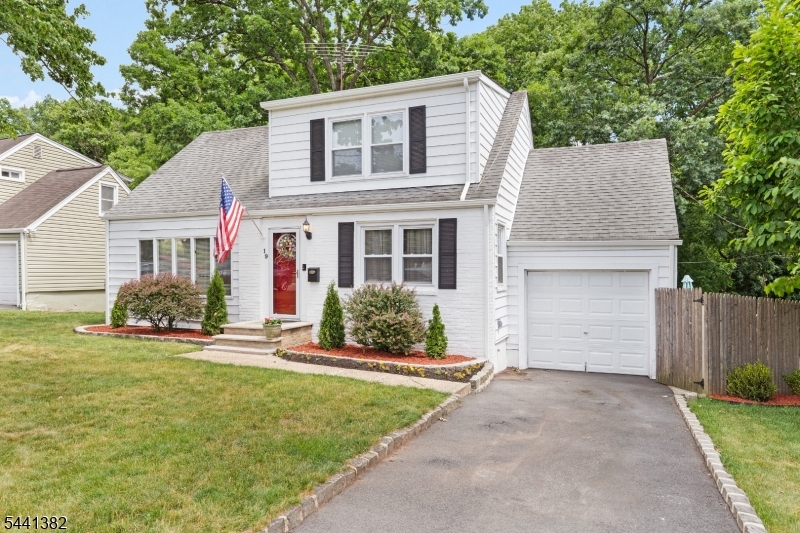 Welcome to 19 Glenview Drive, a charming Cape Cod located on a quiet dead-end street in the highly sought-after St. Cloud section of West Orange, bordering Livingston. This move-in-ready home offers the perfect combination of comfort, convenience, and outdoor living. The private, fully fenced backyard is an entertainer's dream, spacious patio, and expansive decks ideal for summer gatherings and relaxing evenings. Inside, hardwood floors flow throughout the main level, while the updated eat-in kitchen boasts Quartz countertops and stainless steel KitchenAid appliances. The flexible floor plan includes a convenient first-floor bedroom and two generously sized upstairs bedrooms. The home is equipped with forced hot air heating and central air conditioning, providing year-round comfort. Plumbing is already in place for a potential second bathroom on the upper level. The finished walkout basement provides additional living space, direct backyard access, and abundant storage with an extensive crawl space.Ideally situated near South Mountain Reservation, outdoor enthusiasts will enjoy easy access to hiking, biking, and nature trails. Commuters will appreciate the short walk to NYC bus transportation, and school bus pickup is conveniently located across the street. Enjoy the peaceful setting of a quiet neighborhood while remaining close to shopping, dining, parks, major highways, and everything West Orange has to offer.