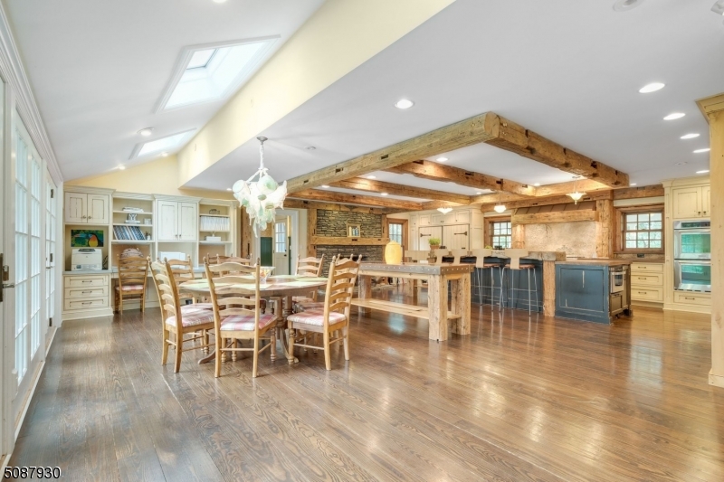 Offer has been accepted, back up offers only!One-of-a-kind Colonial on 6.5 acres in a unique community of secluded estates and private roads. Perfect for today's busy lifestyle, this home has spacious room sizes, chef's kitchen with custom cement countertops, Sub Zero Freezer and Fridge, Wolf stove, 3 dishwashers, beverage refrigerator, center island and enormous fireplace. Butler's pantry, amazing sports storage room with sliding barn doors, 2 powder rooms with vintage details.  First floor with old world touches, cozy study with built-ins, formal living and dining room with fireplaces. Enormous great room with incredible stone fireplace, wet bar and french doors to patio. First floor main bedroom with vaulted ceiling, fireplace and oversized windows.