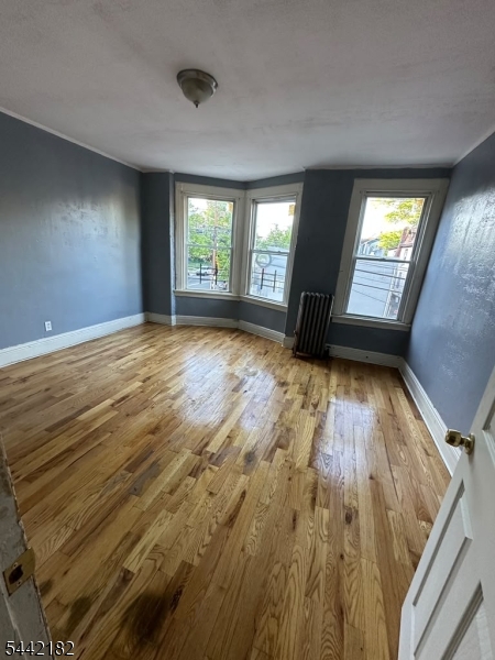 Great price for a non condo option. 3 bed 1 bath, 1/2 duplex home, Hardwood floors.. Charming home.. a must see!