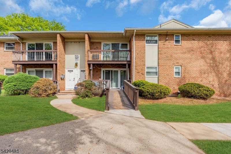 Welcome to this beautifully maintained,  2-bedroom, 1-bath first-floor unit in the desirable Alexandria at Hillsborough Community! Enjoy hardwood floors throughout and a bright, open layout that flows from the spacious living and dining area to a private patio with a secondary entrance perfect for indoor-outdoor living. The kitchen features ceramic tile flooring, subway tile backsplash, and plenty of cabinet space. Both bedrooms are generously sized, with ample closet storage. One bedroom is equipped with a handicapped-accessible roll-in shower and convenient in-unit laundry. This community offers great amenities including a pool, tennis courts, and a playground. Ideally located near top universities like Rutgers and Princeton, major hospitals, and spots such as the New Brunswick Performing Arts Center. Enjoy nearby outdoor recreation at Colonial Park, the D&R Canal, and Duke Island Park. Commuters will appreciate the easy access to NYC via direct bus service.