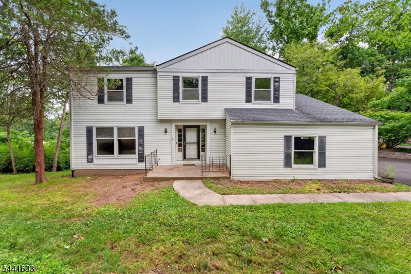 Opportunity meets potential in this classic Colonial.  Nestled on a desirable corner lot in a quiet, mature neighborhood, this spacious home offers exceptional potential for today's buyer. Featuring 5 bedrooms and 2.5 baths, this home combines timeless character with room for modern enhancements. Original hardwood flooring lies beneath the carpeting throughout, awaiting restoration to its full beauty. With generous room sizes and a traditional floor plan, the property presents an excellent opportunity for buyers seeking to add their own updates and build equity. The walk-out basement presents an excellent opportunity for buyers to bring their vision to life. Currently unfinished, this expansive space offers endless potential for customization whether you envision a home theater, fitness studio, guest suite, recreation room, home office, or hobby room. With direct outdoor access and a canvas awaiting your creative touch, this lower level provides the flexibility to design a space that perfectly complements your lifestyle and adds lasting value to the home. This is a rare chance to customize a well-built home with great bones in a sought-after location. Walking distance to park, close to public transportation, Highways, shopping, PA, Princeton, Trenton and much more.