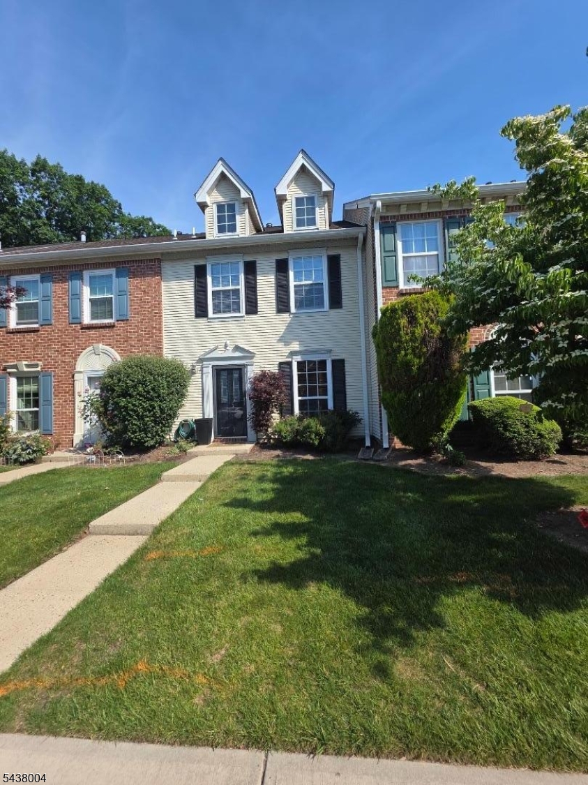 Welcome home to this well-maintained and thoughtfully updated 2-bedroom, 2.5-bath townhouse offering comfort, privacy, and convenience. The first floor features a spacious living room, a formal dining area, a nice sized eat-in kitchen and a convenient powder room. The living room leads to your private deck with additional storage, where you can relax and enjoy the peaceful wooded views. Upstairs, the primary suite boasts a completely renovated bathroom with a stylish walk-in shower, fully equipped with blue tooth speakers. The second bedroom also features its own updated full bathroom, providing comfort and privacy. The conveniently located second-floor laundry closet completes the upper level. With modern updates, a functional floor plan, and a serene wooded setting, this move-in-ready home is an exceptional opportunity for today's buyer