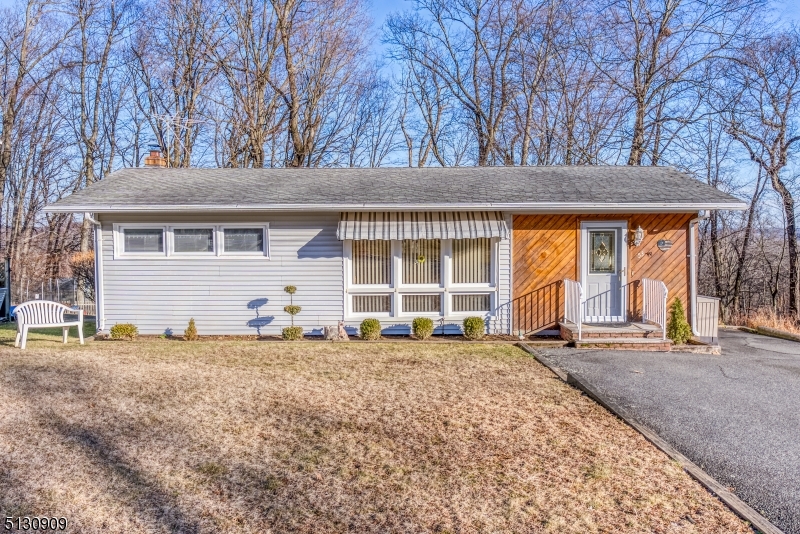 A True Gem! Immaculate Ranch tucked on corner property. Perfect starter or down-sizer home. 1 floor living! Extremely well-maintained & Clean as a whistle. Big living rooms walks out to back deck & boasts, high, vaulted wood plank ceilings. Kitchen offers a ton of cabinet space & breakfast bar. Opens to the dining area. Walls of windows throughout living spaces. TONS of natural light. Super efficient layout. Truly a tranquil setting. 2 nice sized bedrooms & bathroom w/tub shower. Convenient Laundry. Tons of Parking. Enjoy the White Meadow Lake lifestyle w/year-round activities. Clubhouse, boating, fishing, pools, playgrounds, etc. Close proximity to major hwys, NYC Direct Mass Transit, schools & Rockaway Mall w/shopping, restaurants, etc!