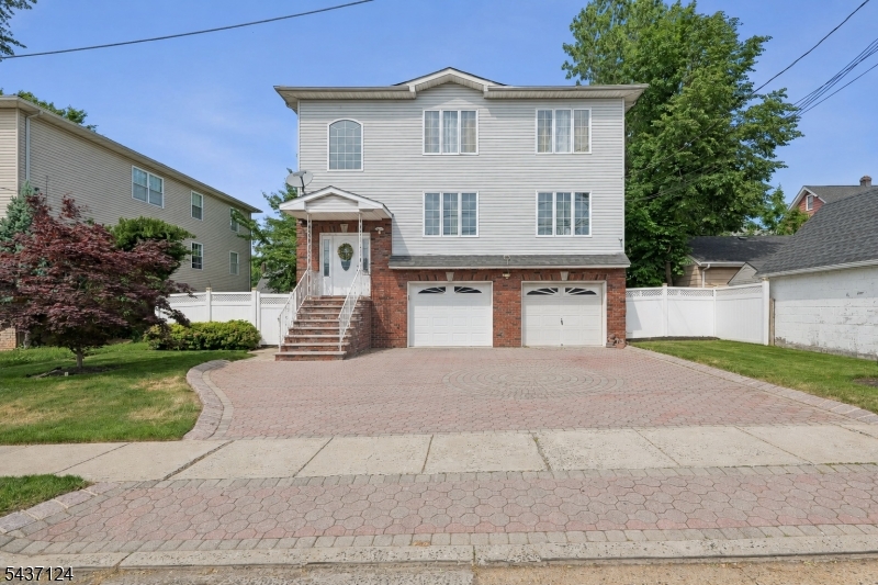 Welcome to this exceptional multifamily home in Linden, NJ, built in 2006 and offering 4,600 square feet of living space. This well maintained income-producing property features two oversized apartments, with one unit offering 4 spacious bedrooms and the other offering 3 spacious bedrooms. Both units feature 2 full bathrooms, generous living areas, and thoughtfully designed layouts for comfortable everyday living. Each unit BOAsts a primary suite complete with a private ensuite bathroom and walk-in closet, while the additional bedrooms feature spacious closets and ample storage throughout. In total, the property offers 5 bathrooms, providing convenience and functionality for both residents and guests. The home also includes a fully finished ground level, offering flexible living space ideal for recreation, a home office, storage, or extended living needs. Additional highlights include a 2-car garage, ample off-street parking, and excellent curb appeal! perfect for investors seeking strong rental income, Owner-occupants looking to offset their mortgage or investors looking to build a portfolio,  this property offers incredible versatility and long-term value. The home is fully tenant occupied, creating an immediate income-producing opportunity. Conveniently located near major highways, shopping, dining, schools, parks, and public transportation, this is a rare chance to own a turnkey multifamily property!