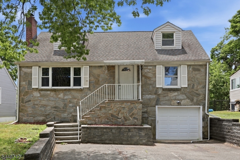 Handyman Special with Incredible Equity Potential! Welcome to 20 Sunnyside Road in desirable West Orange, NJ, offering a fantastic opportunity to create value and make this home your own. Featuring 4 bedrooms and 2 full bathrooms, this spacious property has great bones, a functional layout, and endless potential. The main level offers a bright living room, formal dining room, generously sized kitchen, bonus room, two bedrooms, and a full bathroom, while the second floor features two oversized bedrooms and an additional full bathroom. The full basement provides ample storage and future finishing possibilities. Outside, you'll find a large backyard, patio, spacious driveway, and an attached one-car garage with interior access. Ideally located within walking distance to houses of worship, schools, parks, and the FREE Jitney service to NJ Transit trains for an easy NYC commute, with convenient access to major highways, shopping, and recreation. Whether you're a homeowner looking to build instant sweat equity or an investor seeking your next project, this property offers tremendous upside in a highly sought-after location. Home is being sold strictly as-is. Don't miss this opportunity?schedule your private showing today!