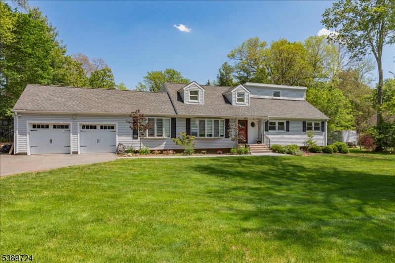 This one of a kind home showcases an expanded 1st-floor primary suite with a renovated spa-like bath, oversized walk-in closet, 3 extra closets, & sliding doors directly to the rear yard. The main level offers excellent flexibility with an office/bedroom, laundry room, sunroom, formal dining room, 1 extra bedroom, and a powder room. Upstairs, 4 generously sized bedrooms include one with a walk-in closet, along with a full bath and a finished storage room/walk-in attic. The partially finished basement, updated in 2025, adds more rec/living space. A finished two-car garage with new overhead doors, long driveway, and ample parking complete the home. The updated kitchen features premium Bosch appliances, including a side-opening double oven, and overlooks both the front lawn and resort-style backyard. Designed for seamless indoor-outdoor living, the home opens to a stunning backyard retreat with a newly converted saltwater pool and new filtration system, refinished hot tub, mature landscaping, vibrant gardens, walking paths, and multiple entertaining areas. Recent upgrades include a paver walkway to the front entry, refreshed front steps and railings, refinished hardwood floors, estate fencing, rear retaining wall with railing, rear patio, and a fully equipped outdoor kitchen beneath a gazebo. Located in one of Somerset County's most sought-after neighborhoods and within a top-rated school district, this Basking Ridge residence blends luxury, comfort, and resort-style living.
