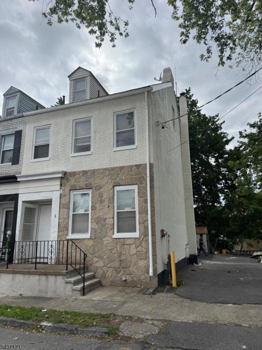 This beautifully renovated home offers 3 spacious bedrooms plus a finished attic that can serve as an extra bedroom. Enjoy brand new laminate floors throughout, a fully updated kitchen, and freshly renovated full bathrooms. Modern lighting fixtures, new electrical systems, and a large parking space complete this perfect package. Move right in and make it your own.