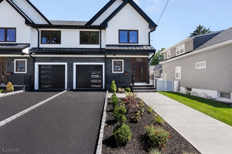 Welcome to this brand new spacious state of the art Townhouse with quick access via rt 80 & 46 to NYC. Located in Albion Section with local park within a block walk. Offering 3-4 bedrooms, 2 full bath and 2 half baths. All upgraded appliances, 36 inch stove, Viking wine cooler, Quartz counter tops and Track lighting. Ring installed door bell and Security Camera smart garage door lift. Central Air with multiple zones, tilt and turn open windows for easy cleaning. Washer and Dryer hookup located on second floor. Sliding glass door to patio with privacy vinyl fence encloses beautifully  landscaped yard providing for outdoor entertainment. Installed Lawn sprinkler system in both front and back yard. The upper and lower levels provide for added Bonus room style recreational space. 10 year warranty included. Quick occupancy. Taxes are approximate. HOA TBD. Subject to minor subdivision in progress. Impressive detailed construction.
