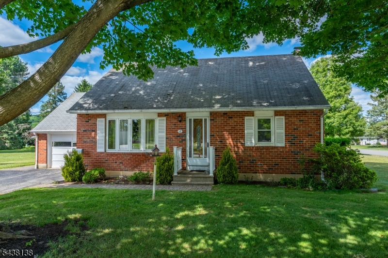 Step back in time and discover the charm of a simpler era. Nestled in one of the area's most picturesque and welcoming neighborhoods, this delightful Cape Cod feels like something straight out of a storybook where neighbors wave from their front porches and evening walks become part of your daily routine.  Brimming with character and endless potential, this 4-bedroom home offers a warm and inviting layout featuring a spacious living room, large eat-in kitchen, one full bath, and one half bath. The unfinished second floor presents an exciting opportunity to expand and create the primary suite, home office, or additional living space you've always envisioned.  The full basement offers high ceilings and tremendous potential for future finishing, providing valuable additional square footage. Outside, the level backyard is perfect for summer barbecues, gardening, play, or simply relaxing and enjoying the peaceful surroundings. For added peace of mind, the seller will install a brand-new septic system prior to closing.  Public water and natural gas are available in the street, offering future convenience and flexibility. All this while being just minutes from Route 80, shopping, dining, and everyday amenities.  Whether you're looking for your first home, a place to put down roots, or a charming property to make your own, this is a rare opportunity to own a piece of timeless Americana. Come experience the warmth and character of 18 Midland Avenue before someone else calls it home.