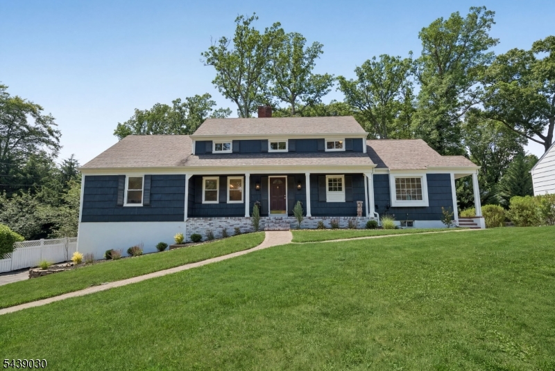 this custom one of a kind storybook home where the charm never ends & the size of this home will astound! Perched on a lushly landscaped mature parcel in highly coveted & prestigious Convent Station section of Morris County the neighborhood feels like home & is moments away from NJ Transit train station, Mo-town hospital & major highways!  The stately home will impress the moment you arrive with a paver top path meeting to a covered porch entry. Enter into the foyer that opens to a front Large kitchen ss appl, pantry, sep dining area access to yard, laundry & leads to the formal DR that is open to LR anchored w/1 of 2 wood FP& a wall of windows overlooking the ground, & gigantic paver patio perfect for entertaining.  A main level Primary Ste, w/dbl closets , updated bath &   as well as two addl large bedrooms w/ample closet space & updated main bath complete this level.  The upper level features a sun drenched open loft space connecting to 2 generous bedrooms, main bath complete 2 walk in attic spaces that are enormous!  It doesn't end there the LL presents a palatial den w/custom built ins on one end & an elegant brick surround FP on the other wall as well as PR, wall of windows & access to the patio.  Addl features include ahumongous storage area, workshop, utility area & oversized 2 car garage.  this home is such a surprise you  as one appears to be is not what it is. It is a quite impressive sizable home.  This picture perfect & a must see!!!