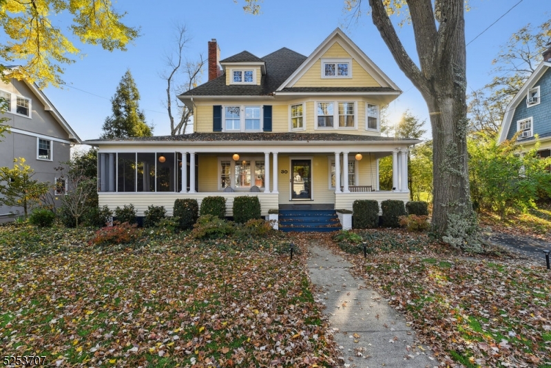 Stunning 5 bedroom, 4.1 bath renovated Colonial located on a beautiful sought after street close to the vibrant downtown village and MidTown Direct train. You are welcomed by the large wrap-around porch and gracious foyer. This home offers an open concept with modern amenities while still embracing the magnificent period details throughout. The first floor has a striking foyer, a fabulous well appointed kitchen with large limestone center island, Thermador refrigerator and separate freezer, La Cornue stove, cork floors with ample storage plus a terrific mudroom w/vaulted ceiling and powder room. The living room has two custom French doors leading to a private yard and patio while the dining room offers a custom mosaic tile fireplace and French doors leading to a screened in porch. The second floor features an exceptional primary suite, gorgeous bath with soaking tub, stall shower, and double vanity plus 2 additional very spacious bedrooms and a hall bath. The third level offers an expansive multi-purpose room (currently used as a family room), 2 more bedrooms (one currently used as a office), and full bath. The lower level is beautifully finished showcasing a gym, rec room and creative area plus a full bath and laundry room. The attention to detail is evident throughout this unique, one of a kind home.
