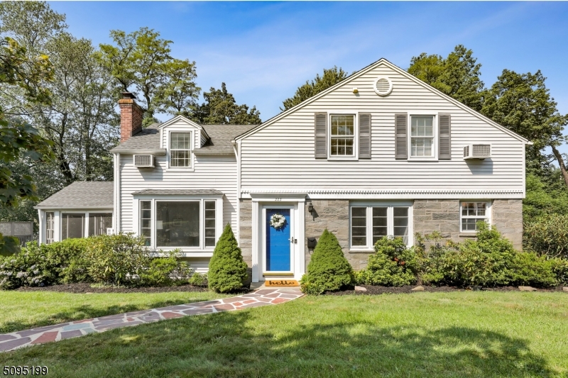 Rare find! 1 mile from the Morristown Green, this East-facing 4 bed/2 full bath Cape is incredibly convenient to shopping, parks, NYC direct train, Morristown Memorial hospital & major highways. Hardwood floors run throughout. The formal living room with fireplace overlooks a sunny bay window and opens to a formal dining room. Enjoy your morning coffee in the sunny 3 season room overlooking the private yard. The updated walk out basement has a spacious rec room (or possible home office), laundry, and oversized 2 car garage.   Need storage? There's also a walk up attic.