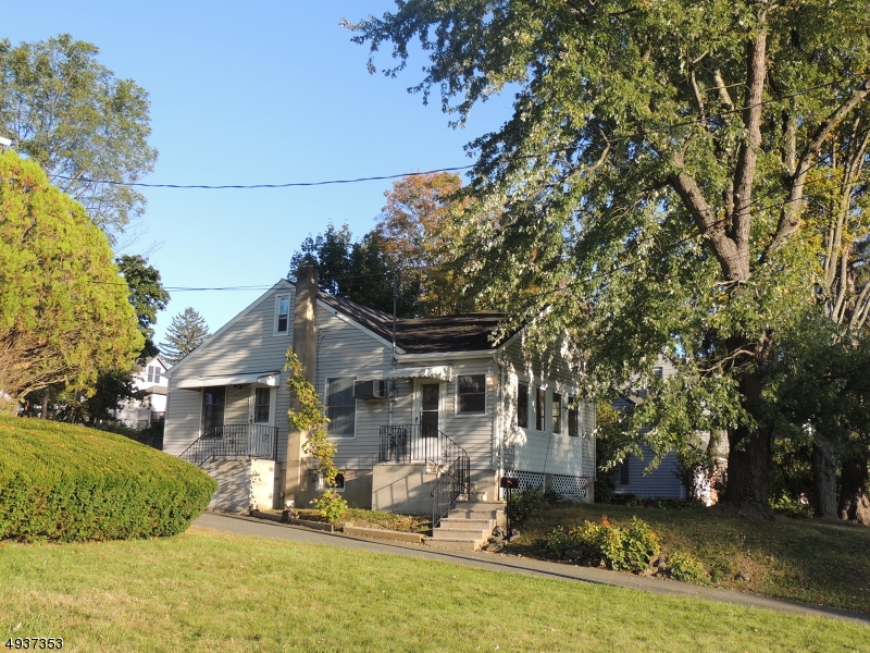 Great, bright and airy ranch on a quiet street with a beautiful yard is awaiting new owners!! It features: large eat in kitchen; hardwood floors in spacious living room and two bedrooms; wonderful sunroom as well as full, partially finished basement and one car garage.  The large yard is perfect for entertaining!! Gas on the street is available if buyers would like to switch.  Welcome to this well maintained and loved home!!
