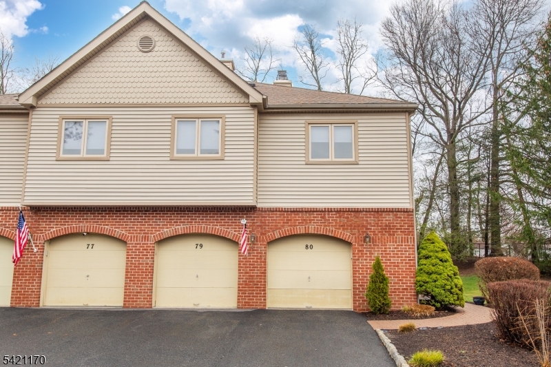 Just move in! Beautifully maintained end unit in the Sunrise at Hanover development. This 2 Bed, 2 full bath unit has a wonderful spacious  floor plan with a eat in kitchen. Primary bath features stall shower and jacuzzi tub.  The Living Room/ Dinning Room has an open concept featuring a  gas fire place and  crown molding, access to spacious deck from living room.Updates 2008 all new thermal windows,2015 HVAC system, 2020 vinyl flooring, carpet bedroom and stairs, microwave, dishwasher, refrigerator. 2021 washer, hot water heater, garage door opener 2023 gas range 2024 dryer 2025 both bathrooms ceramic tile floors. Custom fitted California closets. Pull down stairs for more storage in atticHOA fee is $401.03 There is a working capital fee x 3 due at close 1,203.09 Water is $29.33 per month