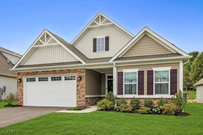 Located in The Village at Hawk Pointe, this beautifully upgraded custom home, finished in Dec 2023, is one of the last homes built in the neighborhood and offers luxury, comfort & privacy. Featuring an upgraded stone fa ade, multi-zone heating & cooling, and countless builder & post-construction upgrades, this 3-year-old home boasts an open-concept layout ideal for everyday living and entertaining. The expansive kitchen features an almost 12-ft island, under-cabinet lighting, gas range, WiFi-connected electric wall oven, and walk-in pantry with custom wood shelving. The spacious living area offers recessed lighting and an upgraded stone gas fireplace with blower. Sliding doors open to a covered rear porch overlooking one of the home's standout features   a rare, private fenced backyard backing to private land. The first-floor primary suite includes a walk-in closet and luxurious bath with Roman shower & dual shower heads. A flexible office/den, second bedroom, full bath, and laundry room with dual hookups complete the main level. Upstairs offers a private loft, additional bedroom, full bath & finished attic storage room with LVP flooring and custom shelves. Additional highlights include an insulated garage with shelving and under-stair storage. Conveniently located near Hawk Pointe Golf Club, ShopRite, restaurants, medical offices, and perfectly positioned between Routes 78 & 80 for easy commuting.This home offers luxury finishes, rare backyard privacy & countless upgrades!