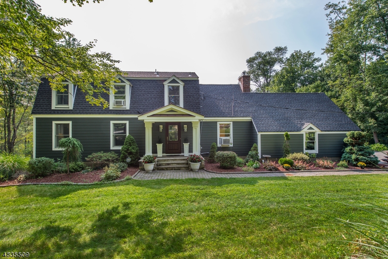 An entertainers dream home! Fabulous 4 bedroom, 3.5 bath colonial on 3+ acres of scenic parklike property. The foyer opens to a spacious living room which leads to the formal dining room. The eat-in kitchen has a center island with seating, granite countertops, stainless steel appliances and a bay window offering lots of natural light. The family rm includes a brick fireplace w/ wood burning insert. Upstairs is the master bedroom with en-suite full bathroom, as well as three additional bedrooms and another full bath. The finished basement has a large wet bar with seating open to the rec room. Also a full bath & lots of storage. The 3 tiered deck is built around the above ground pool and overlooks the flat backyard. The roof, siding, windows and HVAC were all updated in 2016. All this & only 2 miles to Rt.23!