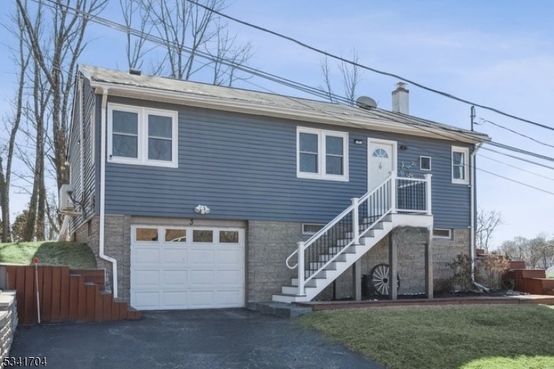 Charming & Updated Ranch in Newton, NJ! Welcome to this extremely well-kept 3-bedroom, 1-bathroom ranch, perfectly situated on a beautiful corner lot in Newton, NJ! This move-in-ready home boasts numerous updates, including a 2024 Trex deck, New siding, and New front steps, offering both style and durability. Inside, you'll find laminate flooring throughout, large living/dining area with beautiful backyard views, a modern kitchen with granite countertops, and a bathroom with a stall shower for convenience. Additional features include a fire-it, generator hookup, and two mini-split systems for year-round comfort. The oversized 1-car garage provides plenty of space for storage and offers direct access to the home. Plus, the full unfinished basement presents endless possibilities ideal for additional storage, a workshop, or future expansion. This lower level is also where you'll find the laundry area and utilities, keeping them conveniently tucked away while maintaining easy access. Nestled in the heart of Sussex County, Newton offers a perfect blend of small-town charm and modern conveniences. Enjoy easy access to parks, shopping, and dining, plus top-rated schools and nearby outdoor attractions like Stokes State Forest and Swartswood Lake. With vibrant community events and a welcoming atmosphere, Newton is a fantastic place to call home! Check the MEDIA DISCLOSURES  for a full list of updates! Don't miss out on this fantastic opportunity