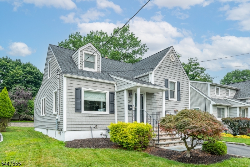 This cozy split level home with stunning kitchen renovation has so much going on. New stunning chef's kitchen renovation with stainless appliances including 6 burner GE Cafe stove, Bosch French Door fridge, granite counters and 5'x5' soapstone island. New floors throughout and new HVAC system. New Anderson windows. The first floor dining room, living room and eat-in kitchen with island are spacious with great flow for all kinds of gatherings. Two bedrooms and the main bathroom grace the second floor with a third bedroom and attic/storage space on the top (third) floor. Below living area you will find a large foyer currently used as an office, but could be laundry.  The basement below has a large room for rec space/ gym, laundry, half bath and a utility room. Outside is an attached garage and a beautiful, level, large backyard with a deck and patio perfect for that summer barbecue. Shopping, eateries, schools and transportation are within minutes of Devonshire Road.
