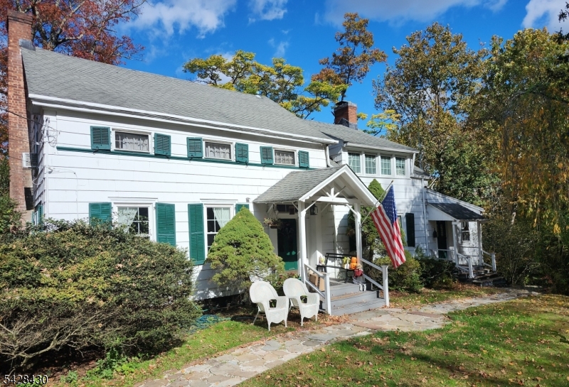 Welcome to West Caldwell and its highly sought-after neighborhood.This Colonial-style home features 3 bedrooms, 2.5 baths, and timeless old-world charm. Situated on .74 beautiful acres with a serene brook running along the back, this property offers a rare opportunity with significant upside potential. The home includes a *(rear) garage and a front driveway, providing ample off-street parking