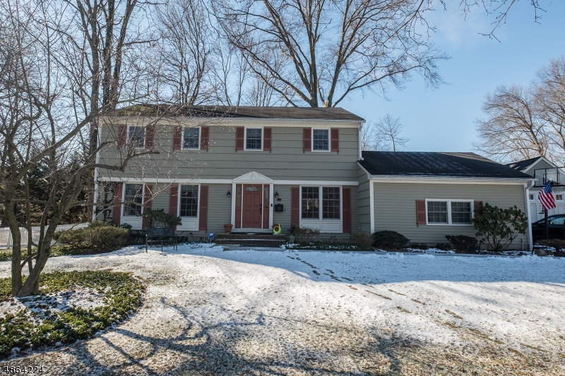 This meticulously cared for 5BD/3.5BA home in the Sherbrooke neighborhood has it all! The welcoming foyer presents a formal living room w/French doors on the left and a chic formal dining room on the right. Wood floors lead to an open plan modern chef's kitchen with granite countertops, custom cabinetry, and sunny fam room w/fireplace. A 2013 addition boasts a mudroom, powder room, and 1st floor laundry that leads to a cathedral-ceiling in-law suite w/sitting room and full bath. The 2nd level includes a master suite w/updated bath and walk-in closet and 3 additional bedrooms with a full hall bath. The finished basement has a rec area & office space w/custom built-in storage. Whole house natural gas generator provides peace of mind. Chatham/Madison trains, convenient to Rts 24 & 287 make it a commuter's dream!