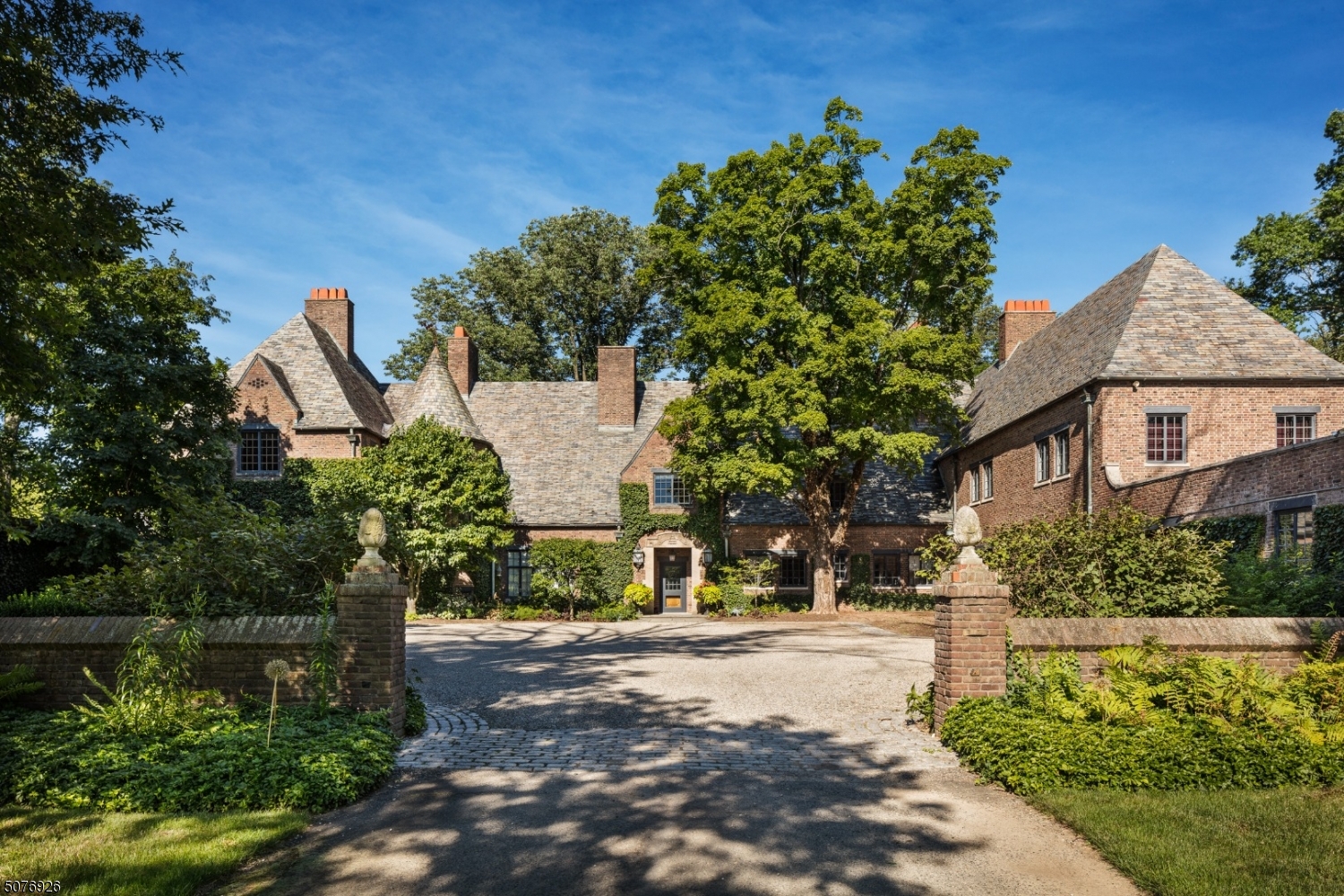 In the heart of New Jersey's renowned horse country, less than an hour outside NYC, resides River Run Farm; a storied 20th century country estate situated on 130 acres along the Raritan River. The ivy-covered brick mansion, designed by the famed NYC architectural firm of Delano & Aldrich, retains bygone elegance while its impeccable restorations & updates provide every present-day appointment. With formal gardens, specimen trees, fountains, pool & patios buffered by acres of open lawns, the estate is expansive & private. The current owners added a full equestrian center with 12 stall barn & indoor arena, accessed by its own private entrance. Two carriage houses, a separate Cape Cod & a barn apartment provide opportunities for rental income, multi-generational living & private accommodations for guests.
