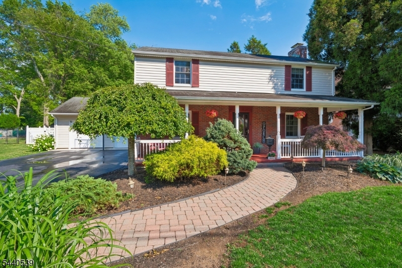 Charming Colonial with Beautiful Curb Appeal on .34 Acres! From the moment you arrive, you'll appreciate the inviting front porch, lush landscaping, and pride of ownership throughout this warm and welcoming East Hanover home. Inside, you'll find three bedrooms, one full bath and one half bath, a spacious living room, formal dining room, and a comfortable family room ideal for relaxing or entertaining. Enjoy classic  details throughout the home including hardwood floors, moldings and built in's. The partially finished basement provides extra living space that can easily serve as a playroom, media room, home office, or gym. Step outside to enjoy the patio and expansive backyard surrounded by mature landscaping a wonderful setting for barbecues, gardening, or simply enjoying the outdoors. Situated on a generous .34-acre property, this home combines classic charm, comfortable living, and a convenient East Hanover location close to schools, shopping, restaurants, and major highways.